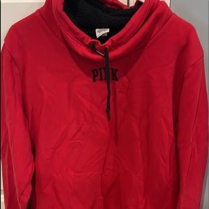 PINK fleece sweater.